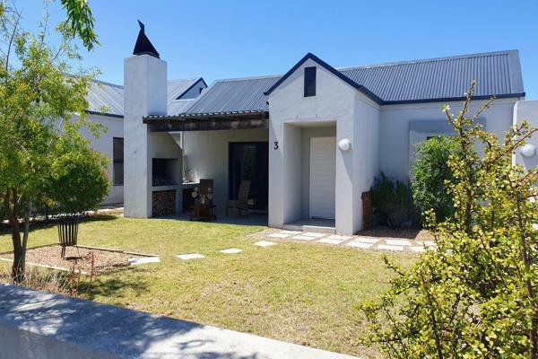 Discover your next home in the tranquil Aan de Wijnlanden Security Estate, where ...