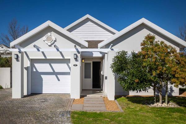 This family home is situated in the charming The Vines neighbourhood at Val de Vie ...