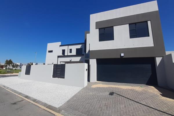 Situated on a corner plot opposite a park, this brand new home offers 4 bedrooms with 3 ...