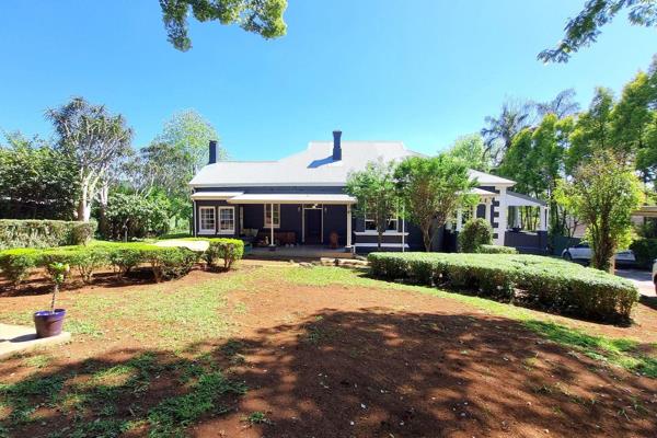 Discover modern old-world charm in this stunning home. Recently painted in elegant black and white, the house exudes sophistication ...