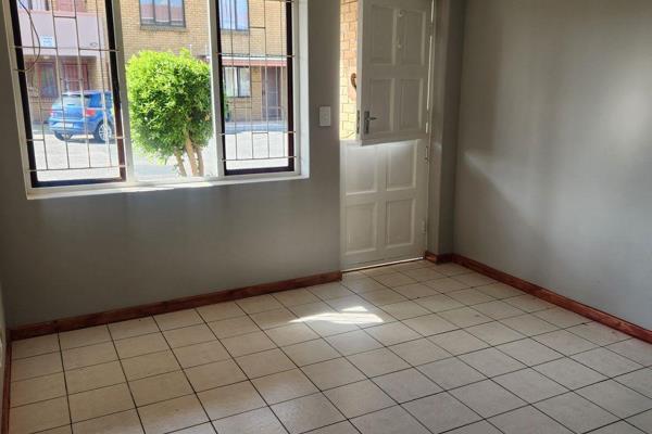 Open plan recently renovated kitchen with loads of cupboard space. 2 bedrooms with BIC&#39;s. Tiled throughout. Prepaid water an ...