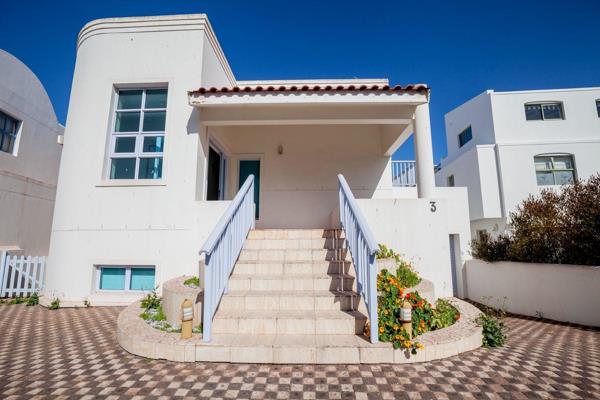 This stunning double-storey home with sea views is the perfect opportunity to make your ...