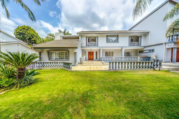Exclusive Mandate. Elegance meets functionality in a setting that is sure to captivate, nestled in a beautifully manicured garden ...