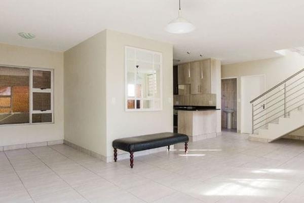 This lovely double storey townhouse boasts with the most modern finishes and is very spacious.

The open plan kitchen has granite tops. ...