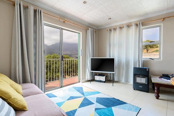 Nestled in the heart of Bo-Kaap, this inviting home offers breathtaking views of Table Mountain. With five rooms, two kitchens, and two ...