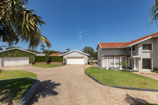 Situated in the heart of Durban North, this stunning panhandle home offers the perfect blend of security, space, and luxury. From the ...