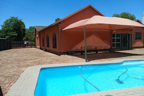 A Picture paints a thousand stories: Charming Three Bedroom Home with Huge Garden &amp; Pool in Culemborg Park, Randfontein!

Nestled ...