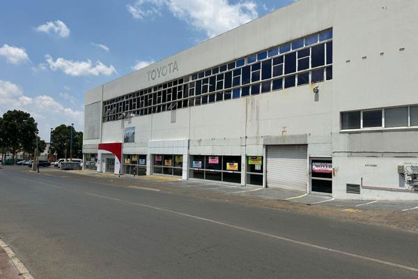 This impressive motor showroom and workshop at 1 Clinton Road, New Redruth, Alberton ...