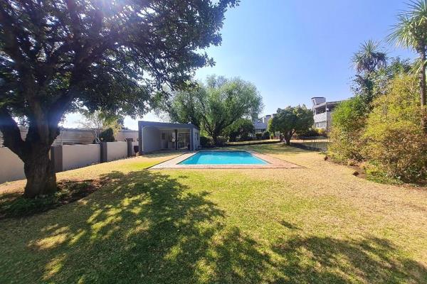 Entrance hall, open-plan dining area and lounge leading to a balcony
Kitchen with a pantry and space for 2 major appliances 
3 ...