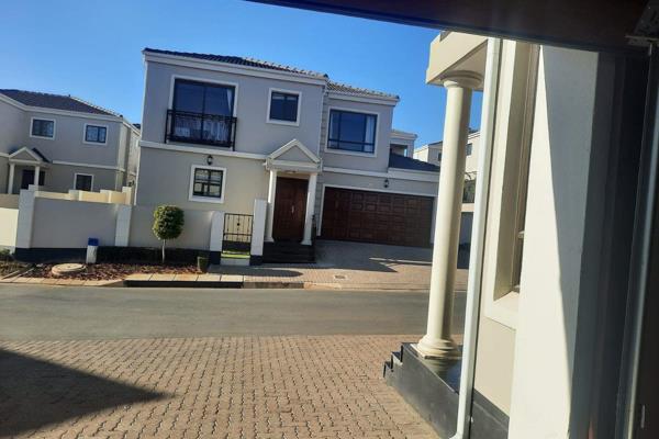 Immaculate family home

 This charming residence boasts modern elegance in the North of Johannesburg. 
On entrance you are welcomed by ...