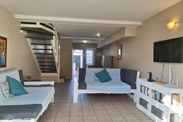 Welcome to your charming coastal duplex situated in a safe and secure complex nestled in Port Alfred, a perfect blend of comfort and ...