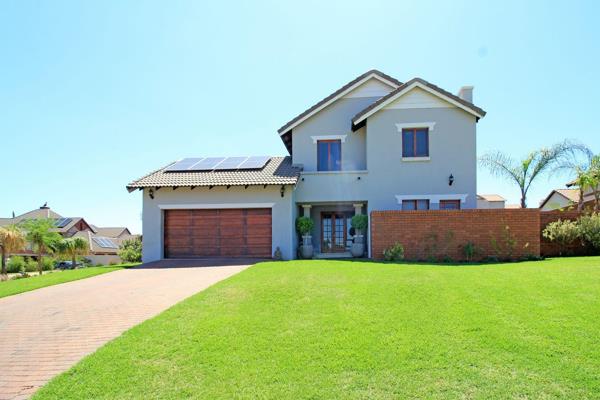 Perfect for a young professional couple with kids, this &#177;283sqm home in Rietvlei Ridge Country Estate offers a blend of modern ...