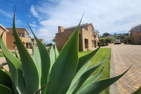 For sale in the picturesque suburb of Menkenkop, Hartenbos: a beautiful townhouse offering coastal living with modern comforts. This ...