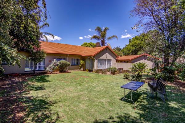 This stunning, spacious home is ready to welcome its new family! With an open-plan living area, elegant tiling throughout, and ...