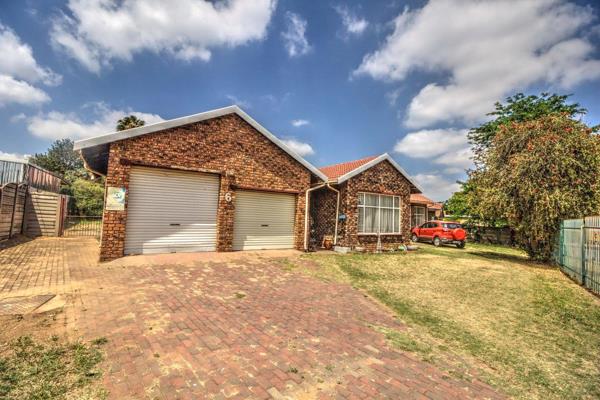 This spacious facebrick family home, conveniently located within walking distance of ...