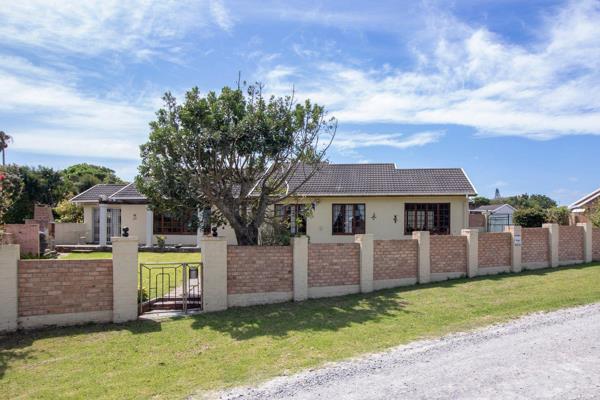 Nestled on a spacious corner plot in Forest Downs, Port Alfred, this well maintained ...