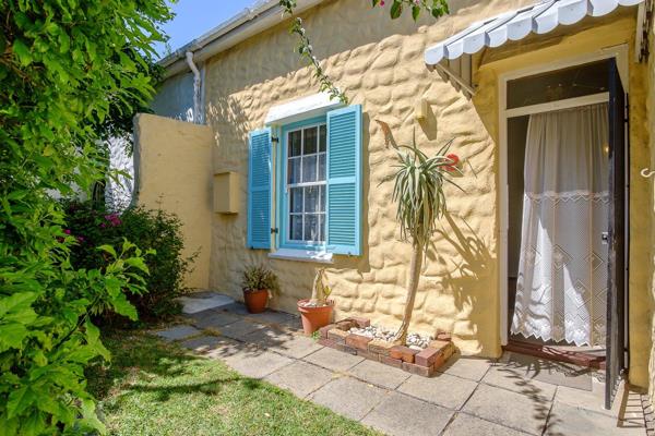 This sturdy, spacious cottage is ideal as a starter home or a small business. The lounge ...