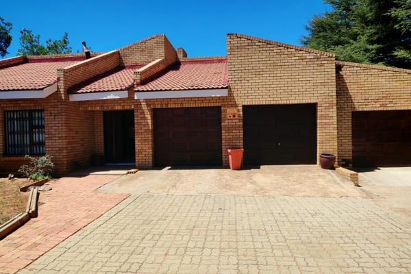 As you enter, you are welcomed by an inviting entrance hall that leads into an open-plan lounge featuring a cozy fireplace, perfect for ...