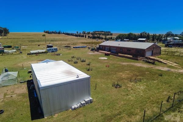 Nestled in a serene Agricultural setting, this contemporary home, constructed within the last five years, boasts modern design and ...