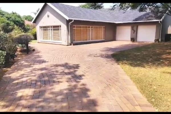 A charming family home nestled in a serene suburb awaits you, boasting two inviting lounges for relaxation and entertainment. A ...