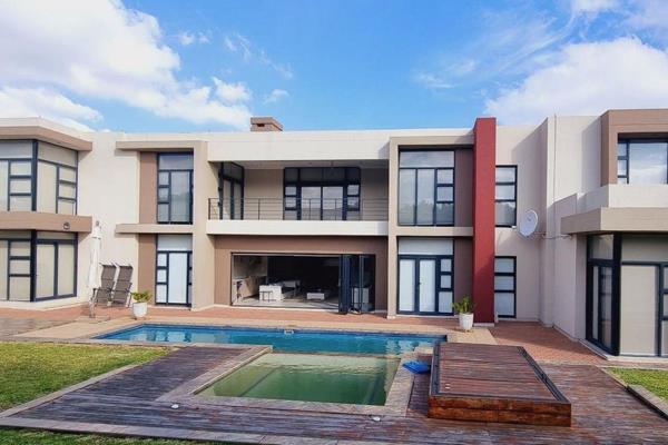 This magnificent 5-bedroom home in Midstream Hill Estate is situated in a quiet cul-de-sac with spectacular views.
It ...