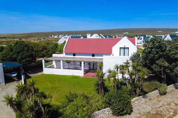 Exclusive Sole Mandate

Location: Nestled in a peaceful neighborhood, just moments from the beach on a spacious plot, Jacobsbaai is known for its stunning coastline and tranquil atmosphere. Enjoy the beauty of sandy beaches and ...