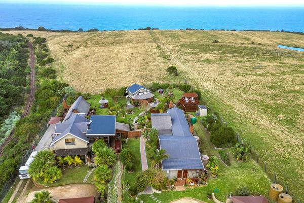 Perfect for the buyer with a penchant for sophistication, nature, African undertones and a perfect location.  And this is exactly where you would find this fully functional Country Villa and Guest Lodge - against the backdrop of the Outeniqua mountain range and overlooking ...