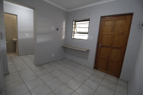 Enjoy a modern bathroom with a gas shower and a tiny kitchen equipped with two gas stove plates. 
Covered parking. 
Water included. ...