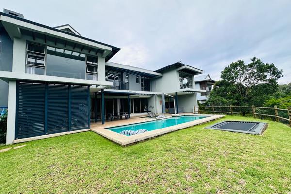 Welcome to this stunning modern 4-bedroom home in the exclusive Simbithi Eco Estate. ...