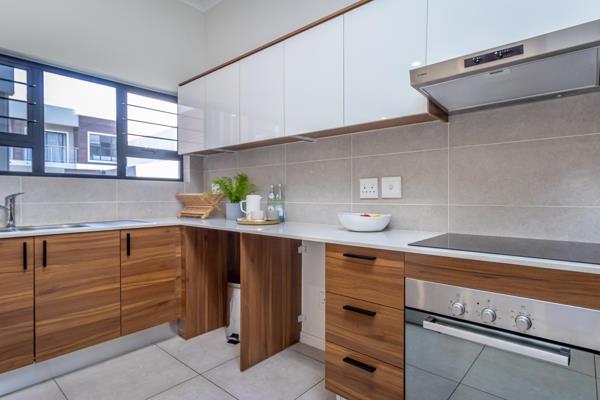 Open plan Kitchen with ample cupboard space space for 2 wet appliances

Spacious iving ...