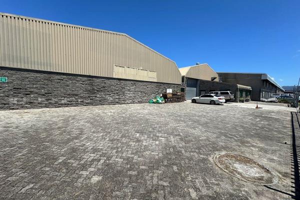 This spacious warehouse offers an ideal setup for various industrial needs, featuring ample height and a large roller shutter door that ...