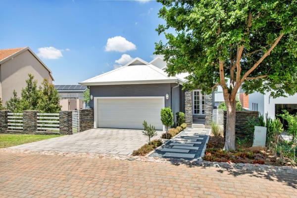 This pristine, modern 4 Bedroom home stands out with its clean, minimalist design, boasting a fresh grey and white exterior. With ...