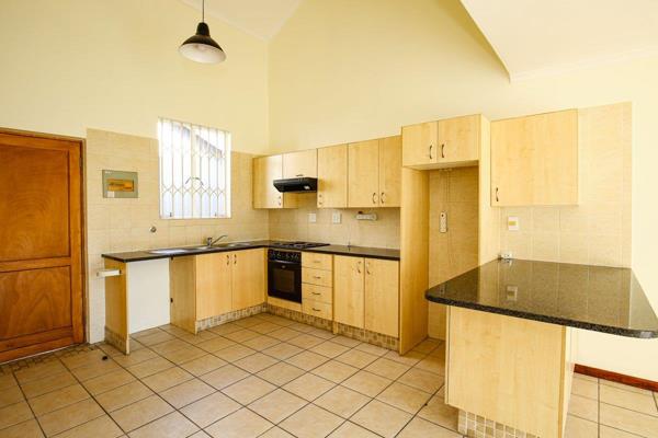 Duplex unit with main bedroom and en suite bathroom with shower downstairs, open plan ...