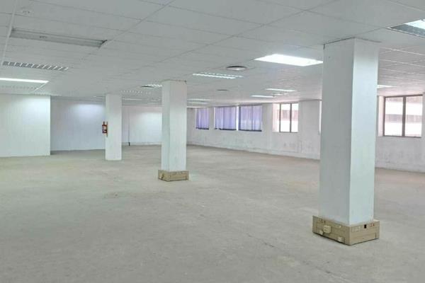 This office space is available for rent and offers a large, open layout that can be ...