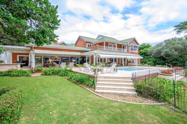 Welcome to an exceptional family home, perfectly situated to capture stunning views over tranquil waters and lush fairway. This rare ...