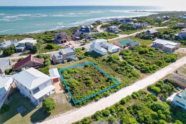 EXCLUSIVE MANDATE : Nestled in the serene coastal village of Suiderstrand, this vacant ...