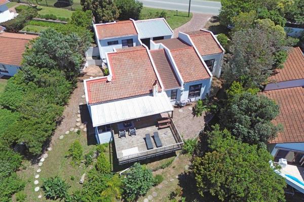 EXCLUSIVE SOLE MANDATE:

Welcome to 40 Robberg Road, a coastal sanctuary in the heart ...