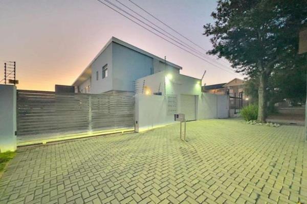 A two bedroom ground floor unit in Walmer with two allocated parking spaces, a built-in ...