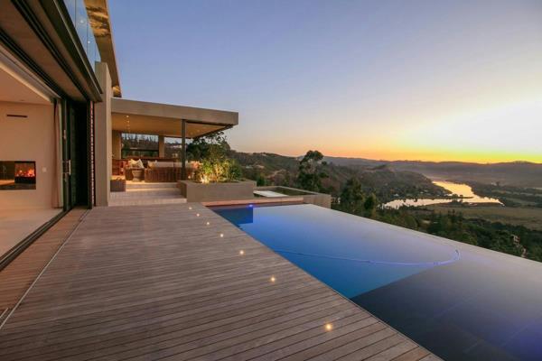 Designed by acclaimed architect Jerome Starkey, this residence boasts sweeping views of ...