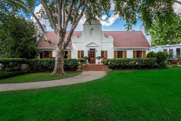 Welcome to this magnificent Cape Dutch-style residence in the heart of Craighall, a masterpiece of timeless elegance. This exquisite ...