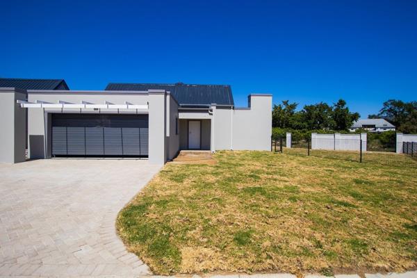 This rental property is identical to this newly built 3-bedroom home which offers modern living in Bergenzicht Estate, framed by ...