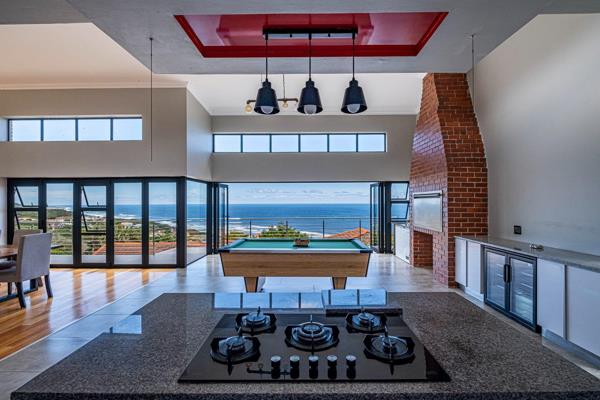 Nestled in a peaceful beachside community, this modern home prides itself with ...