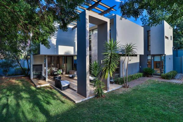 Experience the pinnacle of modern luxury in the sought-after Greenside neighborhood with ...