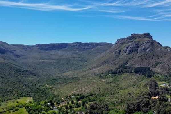 Escape to the lush green crown of the valley, on the sunny side of Hout Bay with jaw dropping views of the back of the iconic Table ...