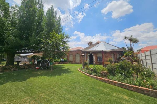 This beautifully maintained brick-and-plaster home offers relaxed living with a neat stoep area and an outdoor patio overlooking a ...