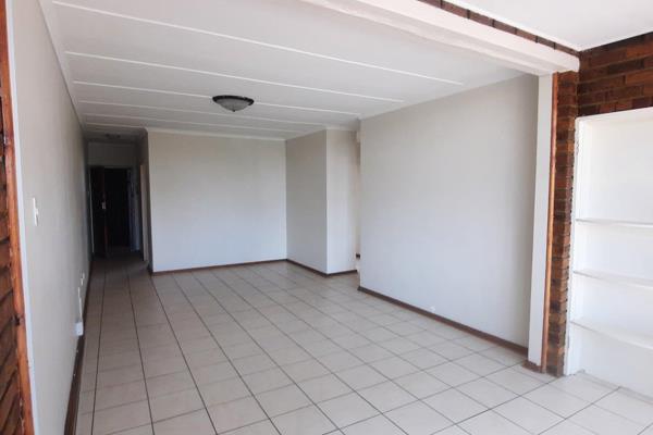 This neat 1st floor unit offers you the following: 
* Open plan, spacious lounge and dining room with tiled flooring. 
* Full fitted ...