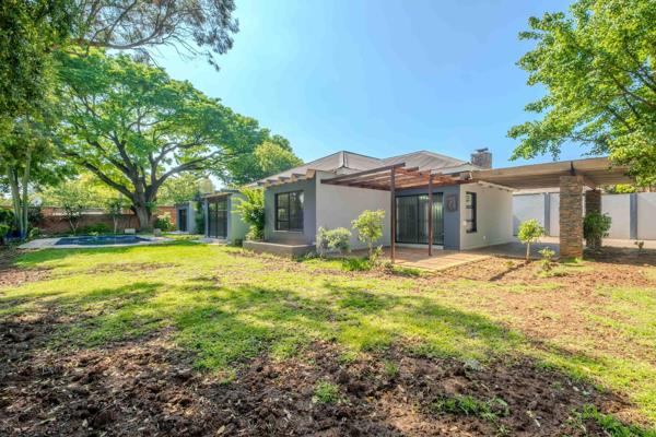 Welcome to this charming, modern family home that blends indoor and outdoor living beautifully. Step into a spacious living area ...