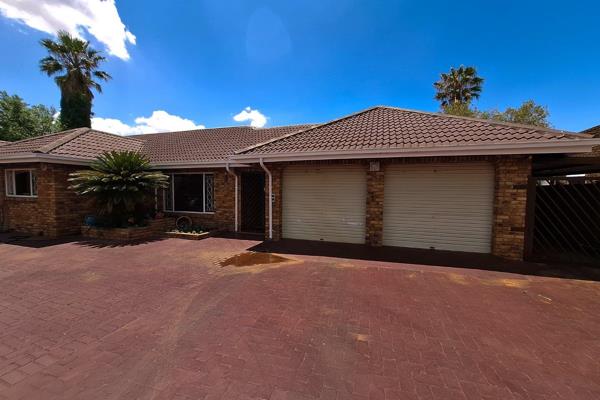 Discover this beautiful, low- maintenance facebrick home featuring three spacious ...