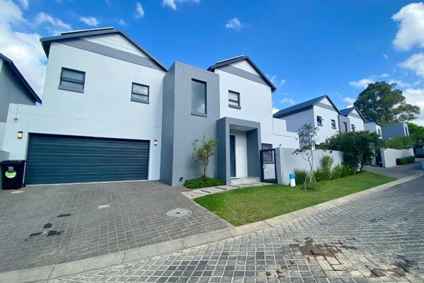 Discover modern living in this stylish 3-bedroom, 2.5-bathroom townhouse located in the heart of Kengies, Broadacres. This thoughtfully ...