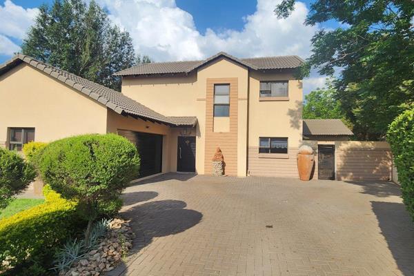 Welcome to this stunning property in the highly sought-after Raslouw Gardens Estate!
Be mesmerized by the front street appearance ...